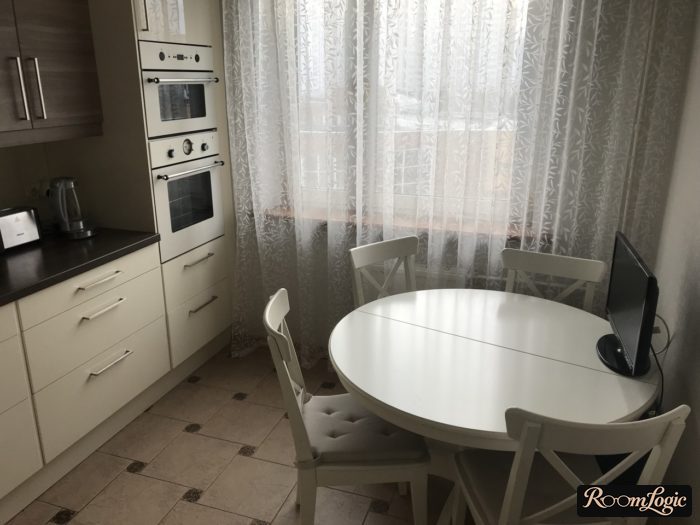 sheer curtain with pattern in beige kitchen