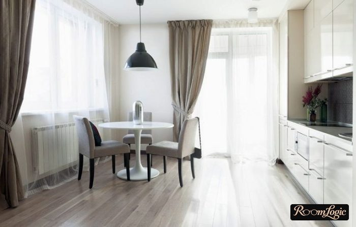 sheer curtains and window treatments on one side of a large kitchen