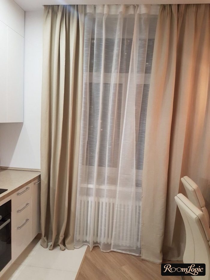 sheer curtains with drapes in kitchen with high window