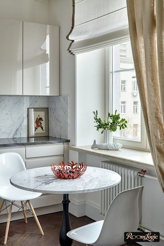 short roman blinds and long regular curtains on the kitchen