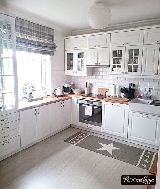 short striped curtains on the kitchen in scandi style