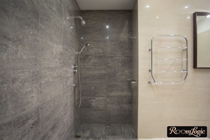 shower with large stone-effect tile