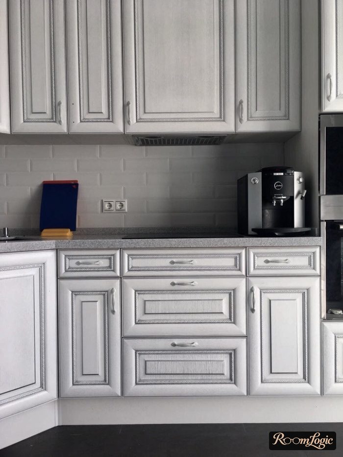 silver and white neoclassical kitchen