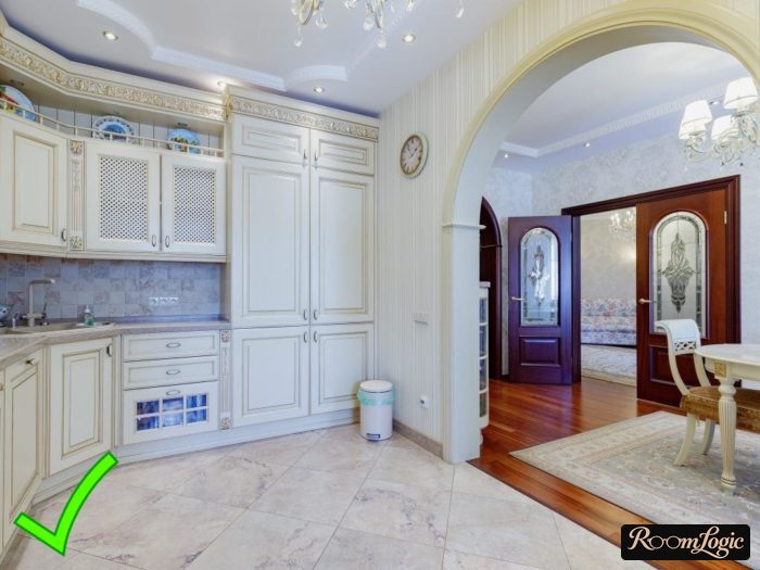 simple beige wallpaper with thin vertical stripes on the kitchen