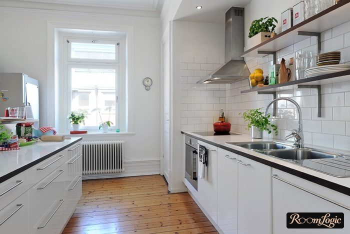 simple kitchen design with an island and no upper row of cabinets