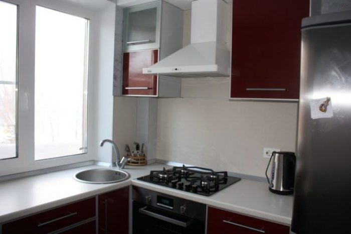 sink in place of window sill in tiny apartment