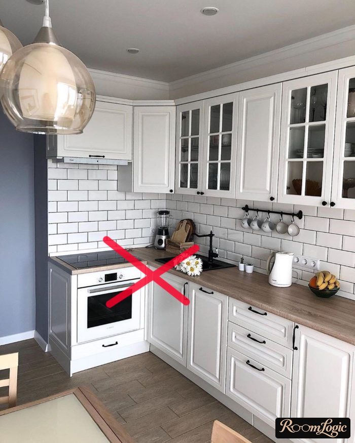 sink next to range in corner kitchen