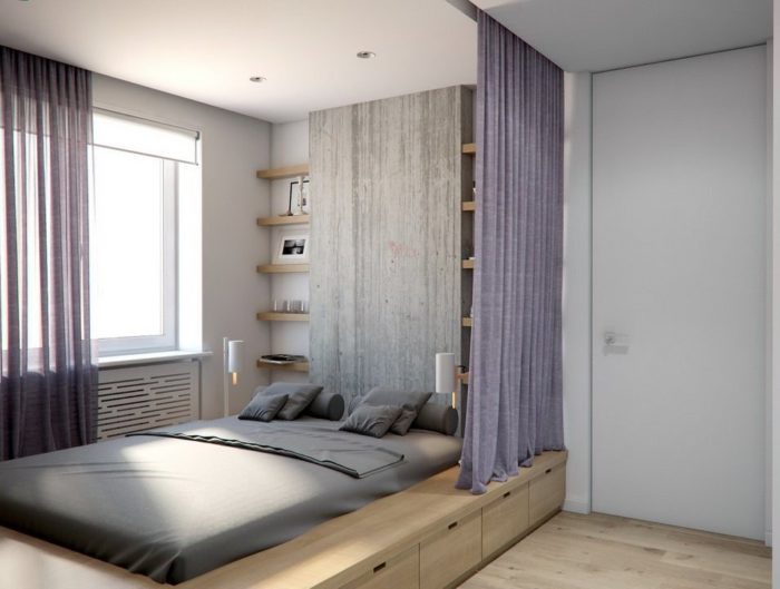 sliding drawers at the foot of the bed