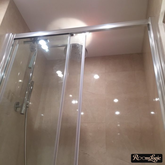sliding shower doors in small bathroom