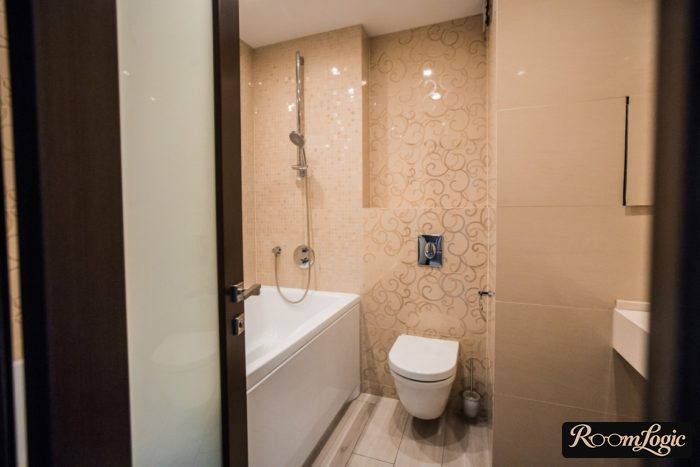 small combined bathroom with toilet