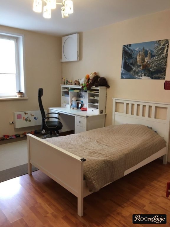 Small double bed in a teenager's room
