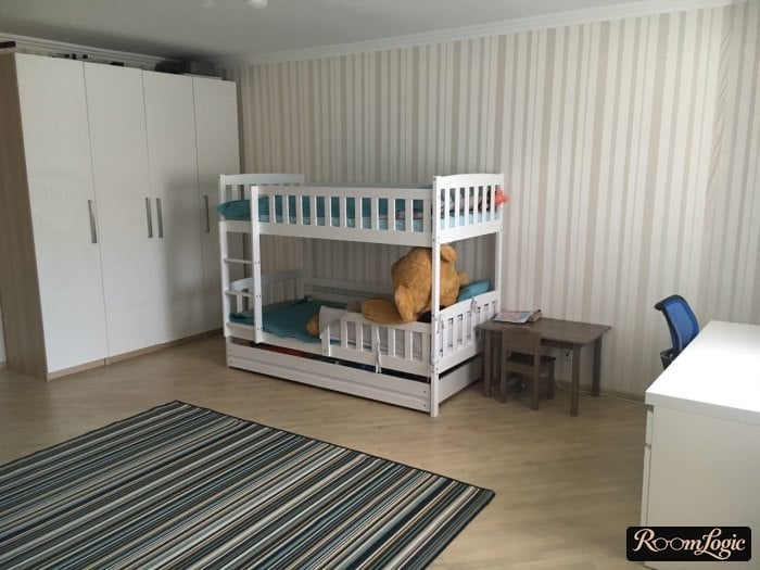 small kids' room with a bunk bed