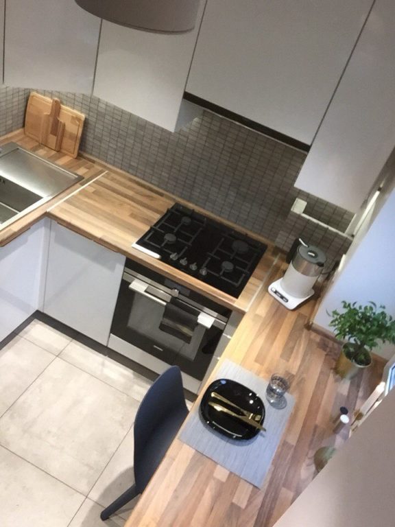 small kitchen with window sill countertop