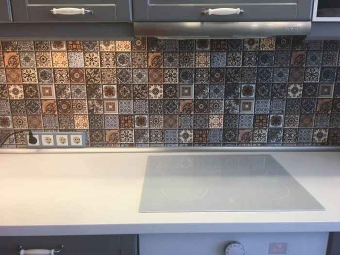 small tile with a pattern on the kitchen backsplash