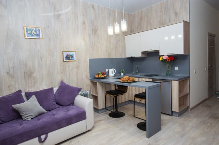 Small U-shaped kitchen cabinets in studio