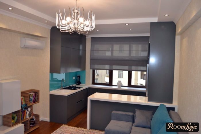 small U-shaped kitchen near the window