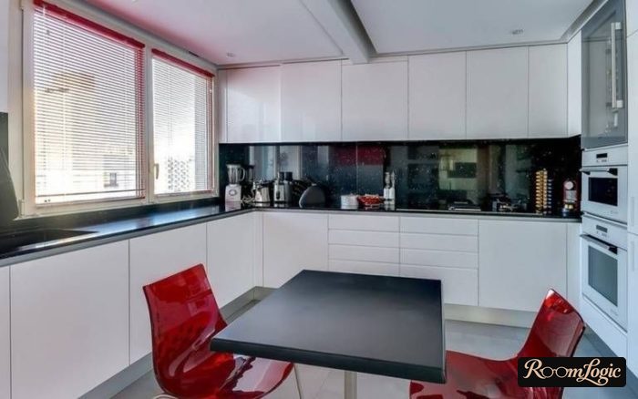 small U-shaped kitchen with a window