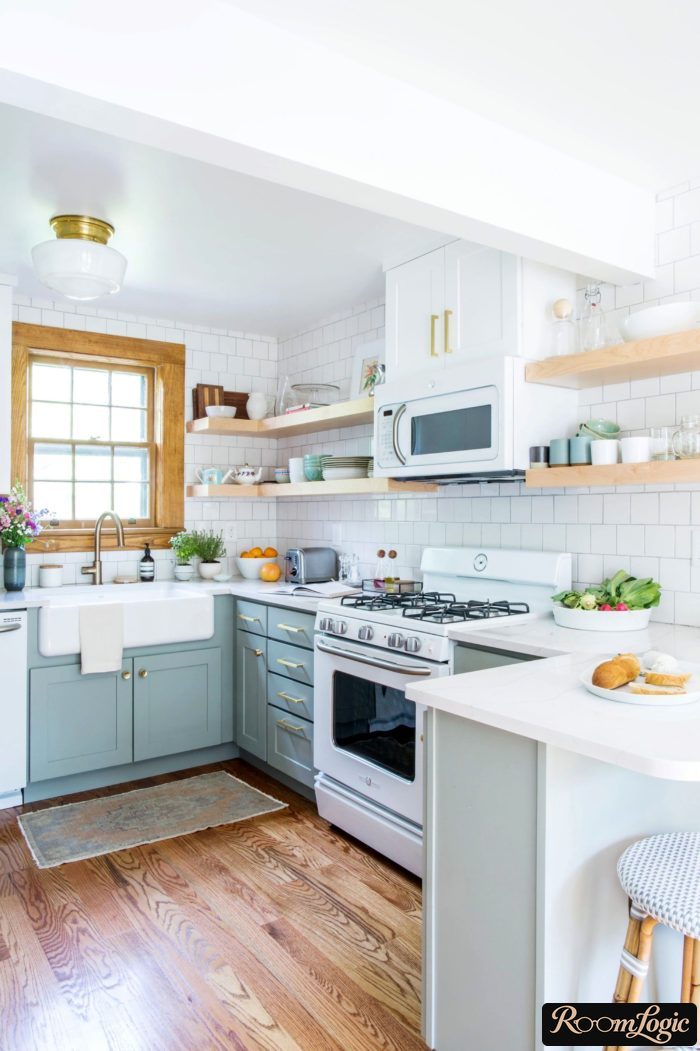 small U-shaped kitchen without overhead cabinets in Scandinavian style
