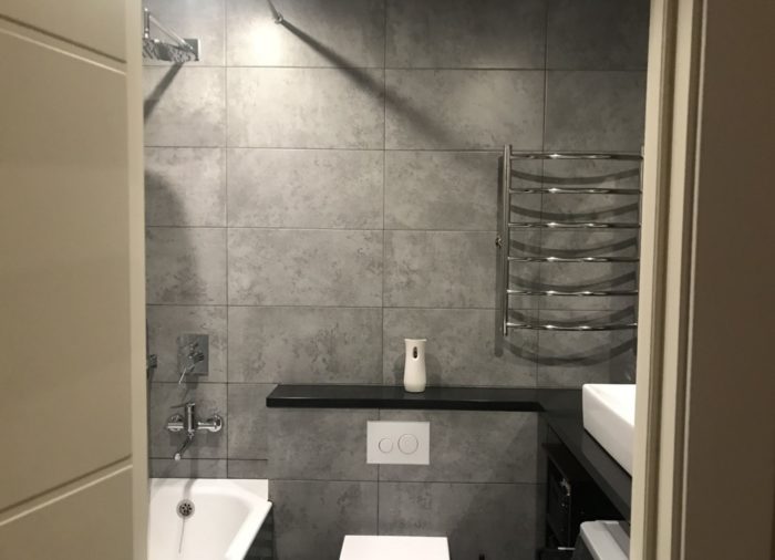 smooth dark gray concrete-look tile