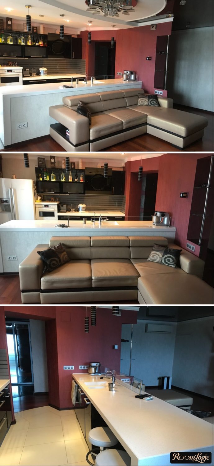 sofa with back against breakfast bar in kitchen-living room