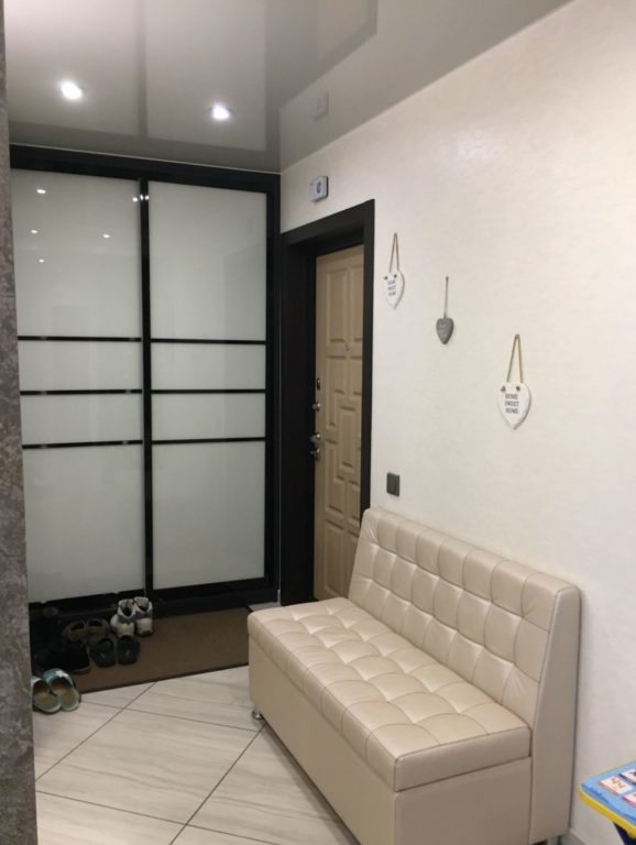 gray square tile in the entryway