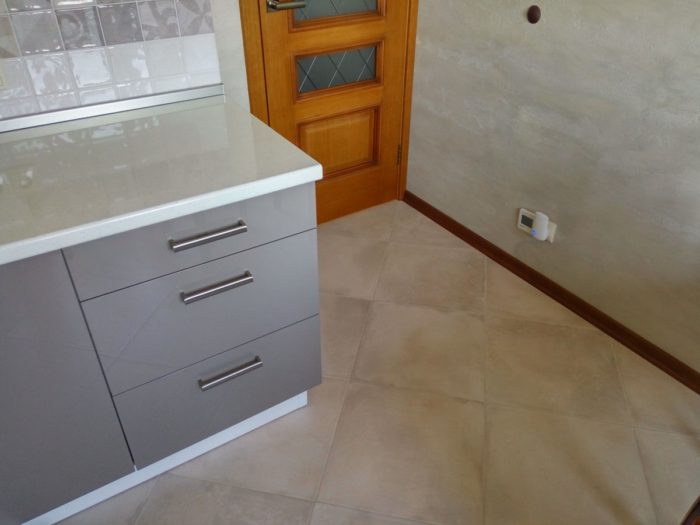 square tile on the kitchen floor