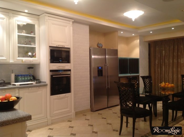 square tile with offset decor on the kitchen floor in a modern classic style