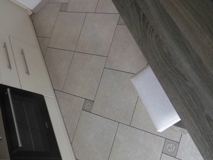 square tile with small squares on the kitchen