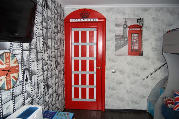 stainless steel door styled after a red telephone booth