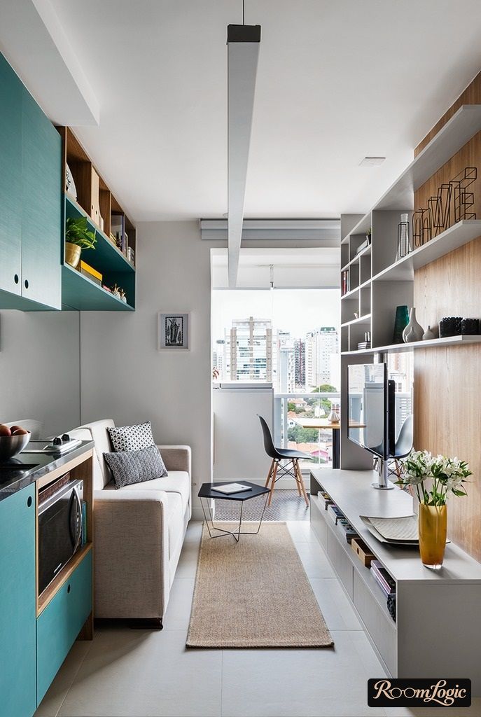 studio apartment with light blue kitchen