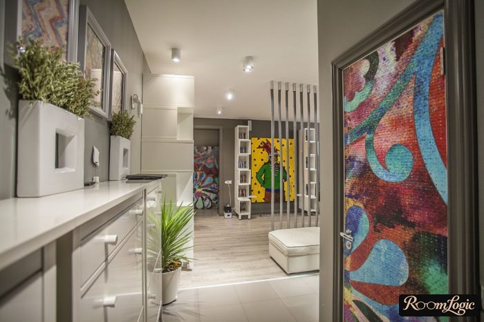 Stylish corridor renovation with a narrow wall cabinet reaching halfway up the wall