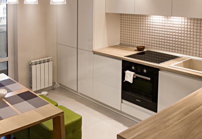 stylish modern kitchen with wooden countertop