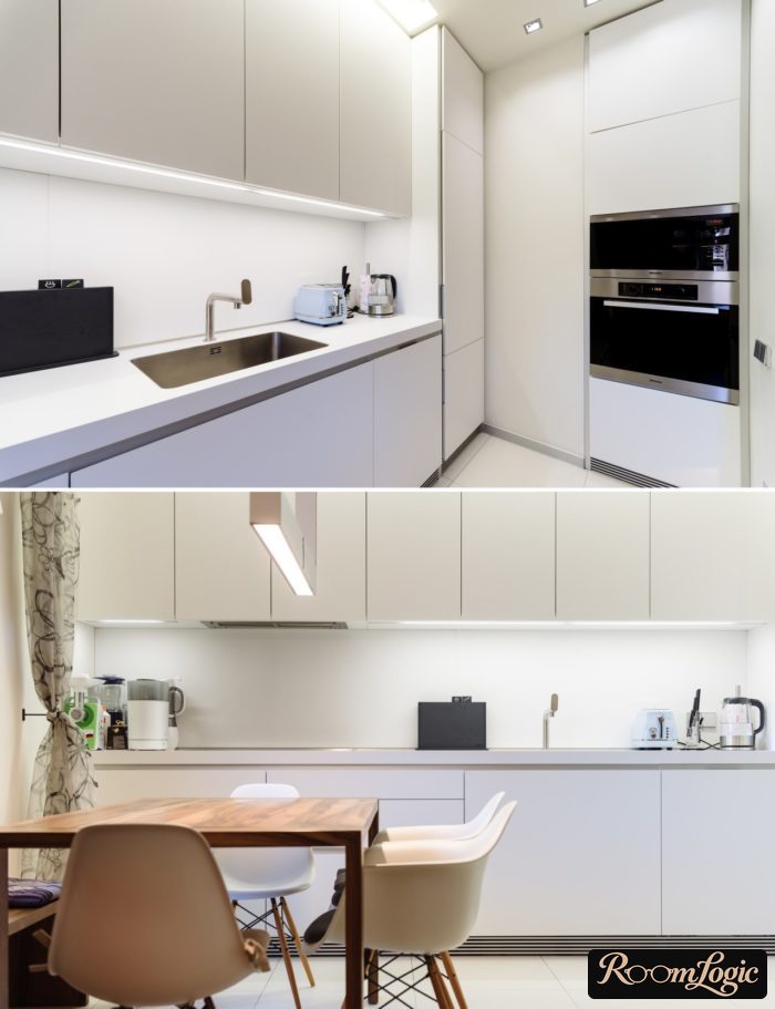 stylish white kitchen in high-tech style in a real apartment