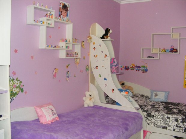 stylish white shelves in kids’ room