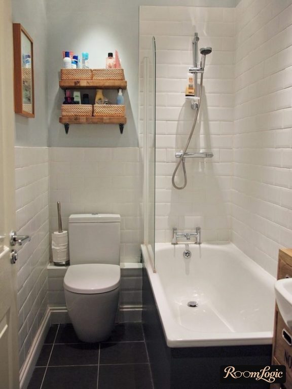 Subway tile in white in the bathroom of a tiny apartment with a toilet