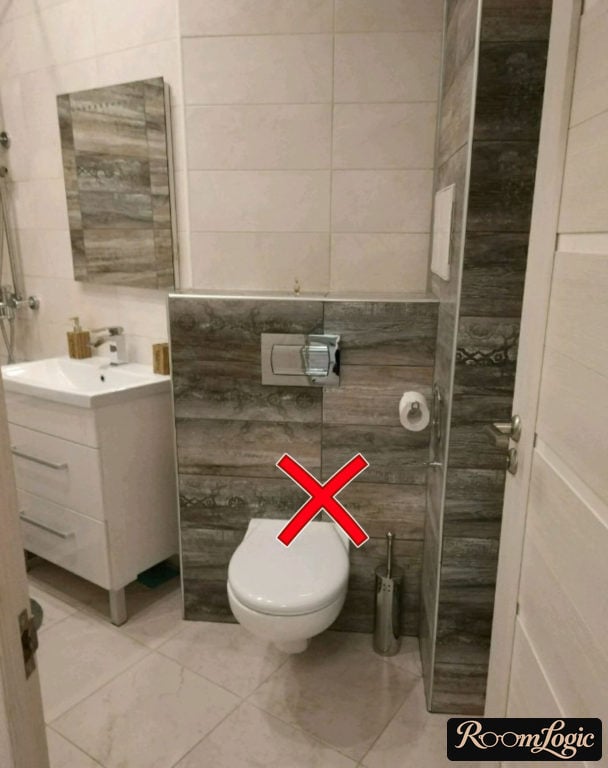 symmetrical tile layout on the bathroom wall