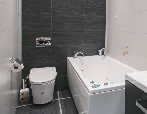 symmetrically tile the bathroom wall
