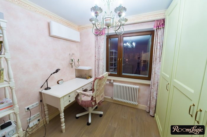 teen girl room with workspace by the window