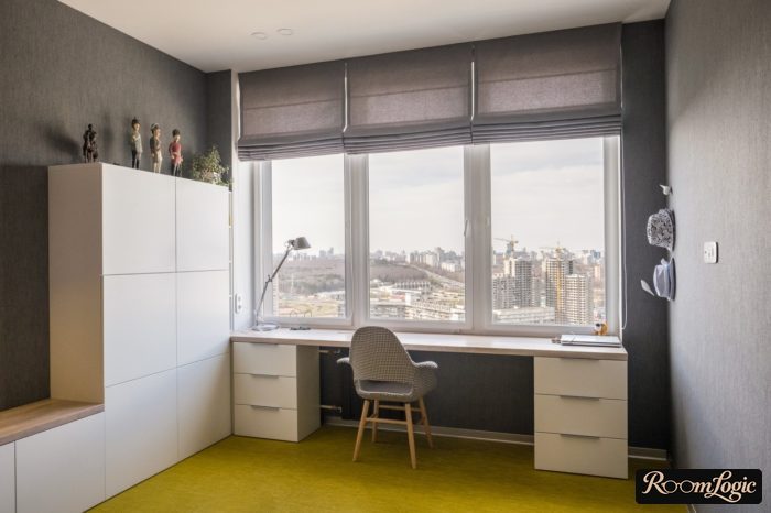 teenager's room with a study area by the window