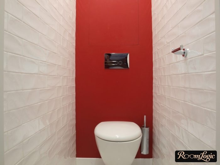 tile and red paint combination in toilet