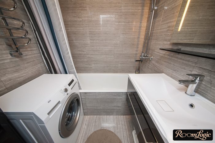 tile floor and walls in small bathroom