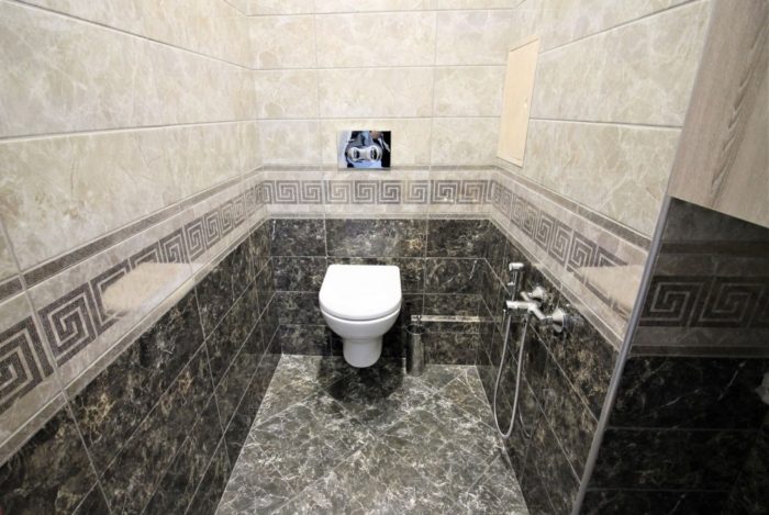 tile in dark marble pattern in the toilet