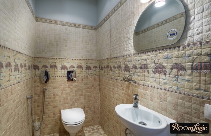 tile to halfway up the wall and wallpaper in the toilet