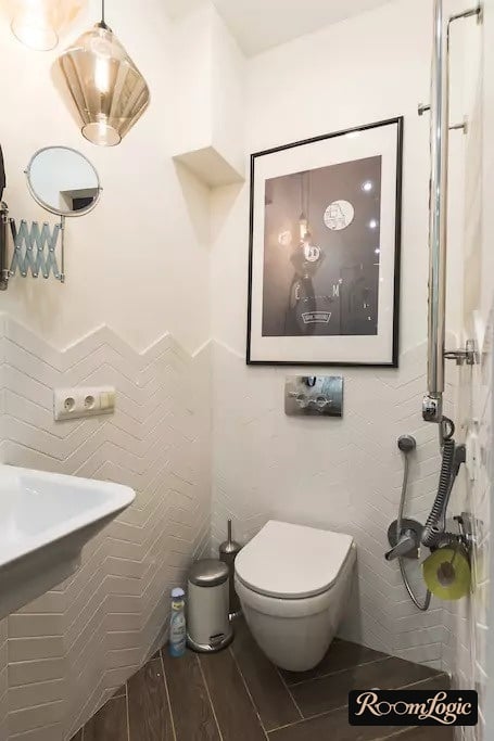 tile to mid-wall in toilet