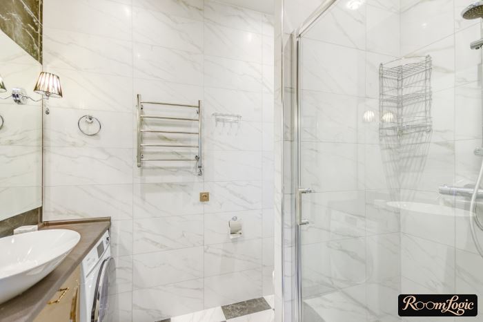 tile wall in bathroom with marble imitation