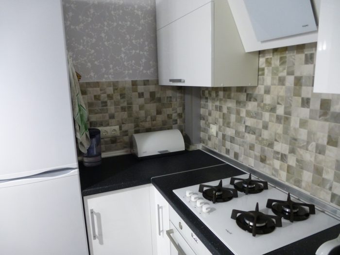 tile with mosaic imitation on backsplash