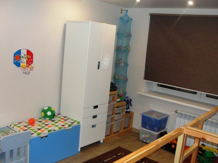toys storage containers in boys' room