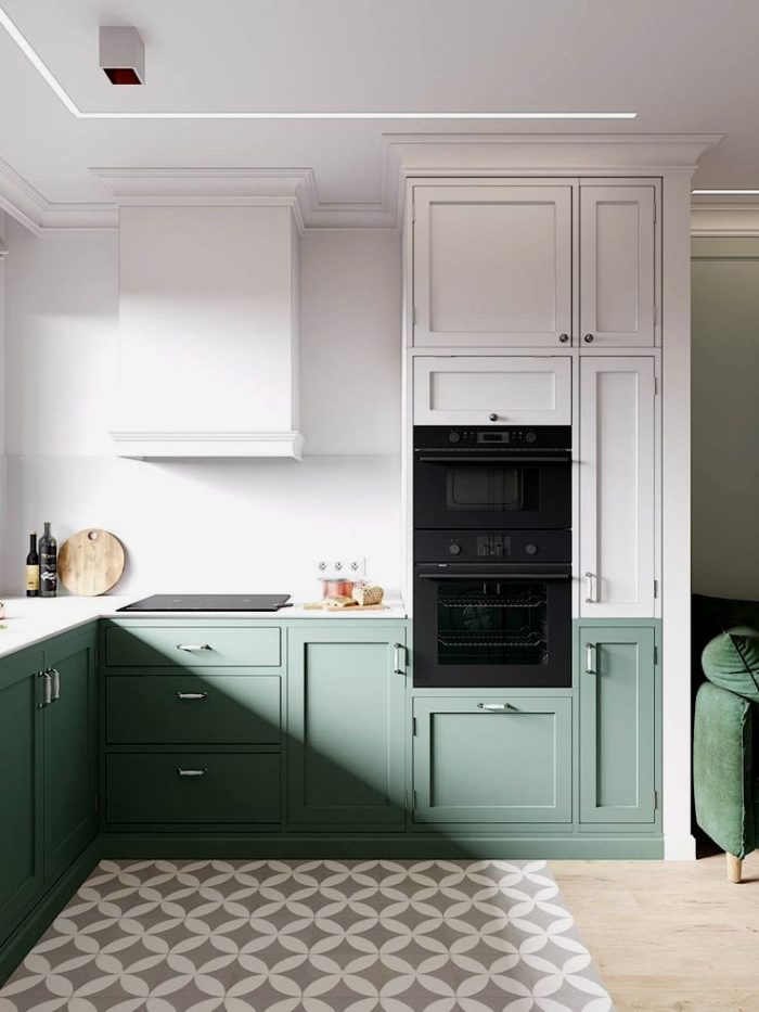 Turquoise kitchen with gray tiled floor with a pattern