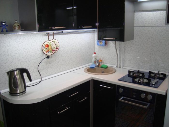 typical corner kitchen layout in a tiny apartment
