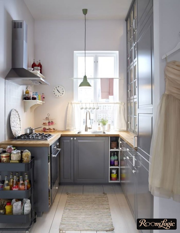 U-shaped gray kitchen with a drawer and shelves on the opposite wall